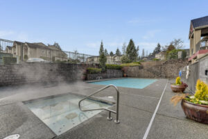 Community Swimming Pool and Hot Tub, gated, Private with no view pool area from surrounding buildings.