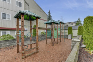 Exterior Playground, Wood Chip soft ground, Perimeter of playground meticulously landscaped